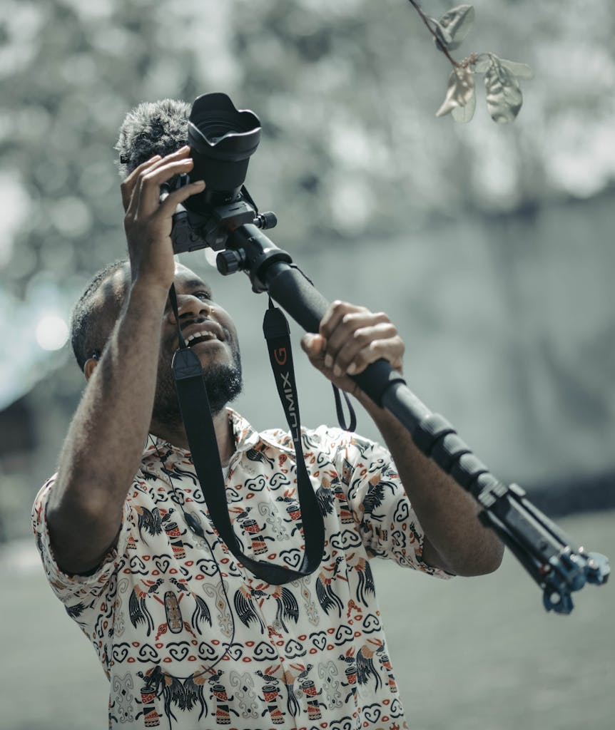 Men holding camera